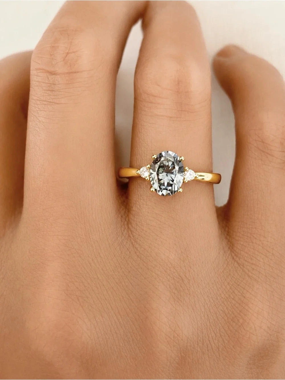 Gold Three Stone Oval Light Gray Blue Moissanite Diamond Sterling Silver Ring